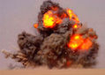 800px-US_Navy_020712-N-5471P-010_EOD_teams_detonate_expired_ordnance_in_the_Kuwaiti_desert.jpg